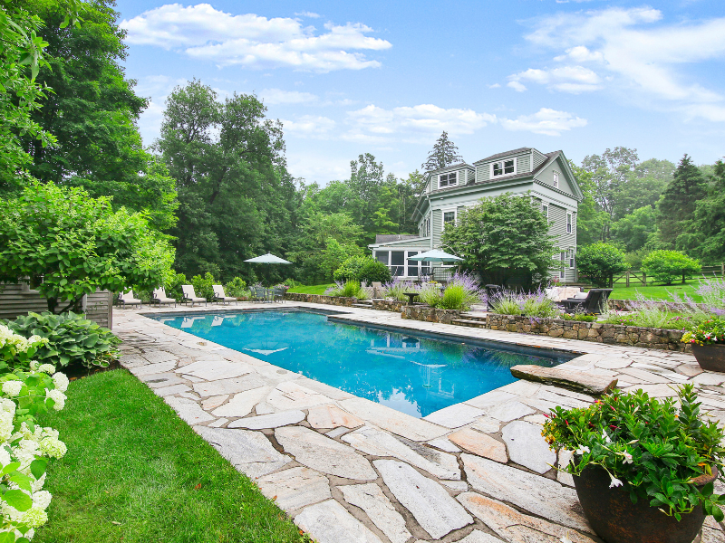 antique property with pool and landscaping
